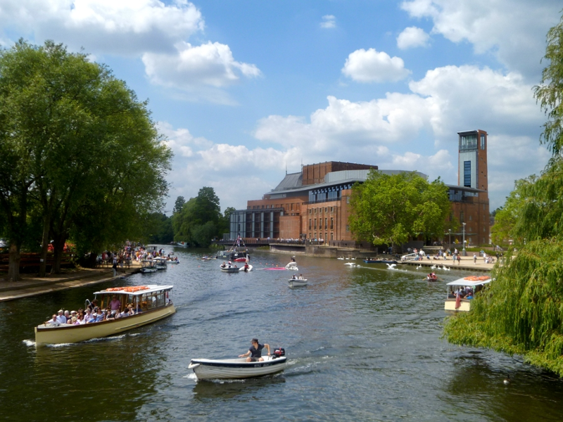 view from a bridge looking along the River Avon towards the Royal Shakespeare Theatre