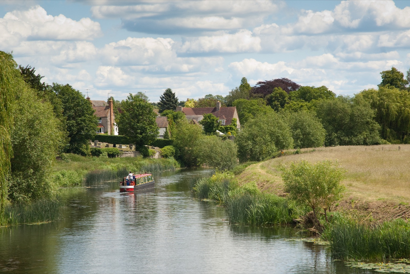 Barge travelling along a river